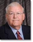 Dr. Harold  E. Henderson